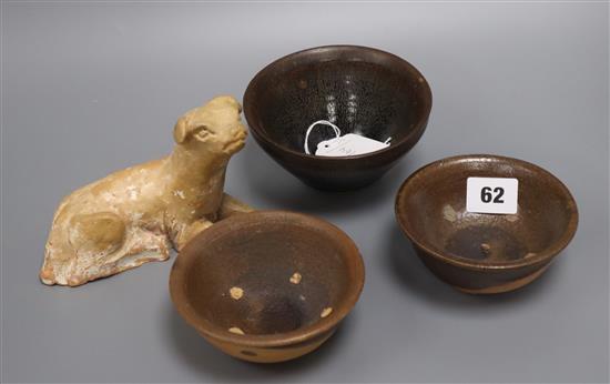 Chinese Sung/Yuan brown glazed bowls and an inscribed Jian hares fur teabowl and a Han dynasty pottery dog (4)